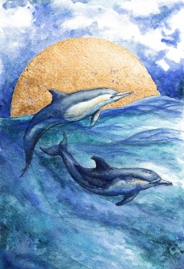 Joyful watercolour painting of two dolphins swimming in front of a golden sun.