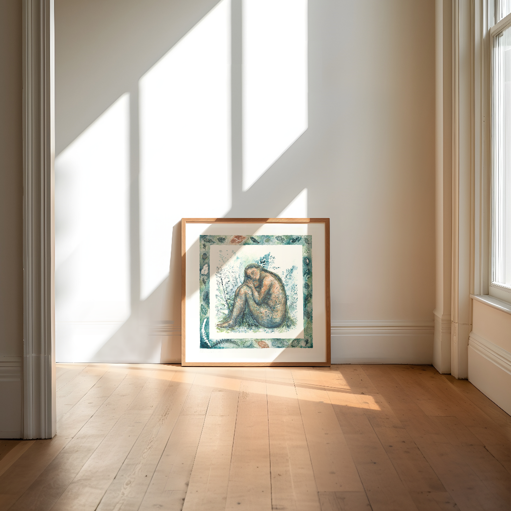 Framed artwork on a wall with sunlight casting shadows