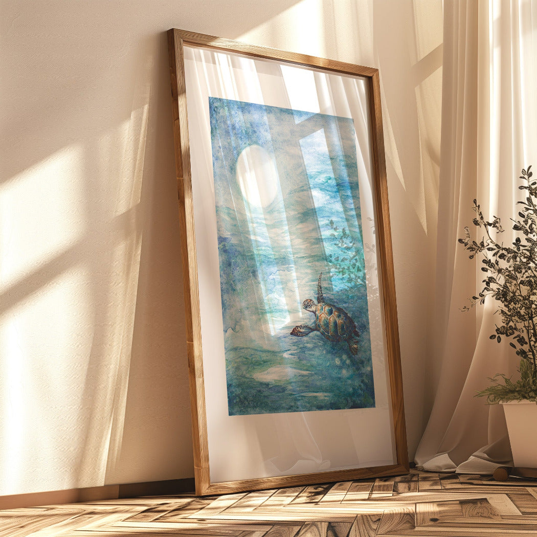 Framed artwork of a turtle in an underwater scene on a wall with natural light.
